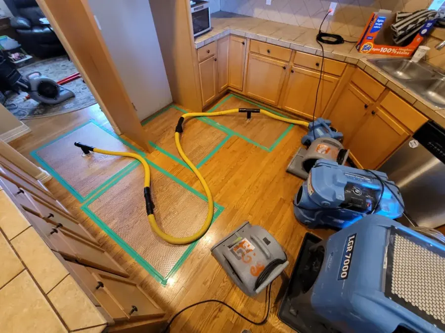 Moisture mapping and drying gear on a Milwaukee kitchen floor