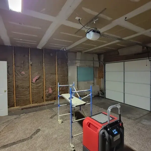Gutted Milwaukee basement with drying equipment